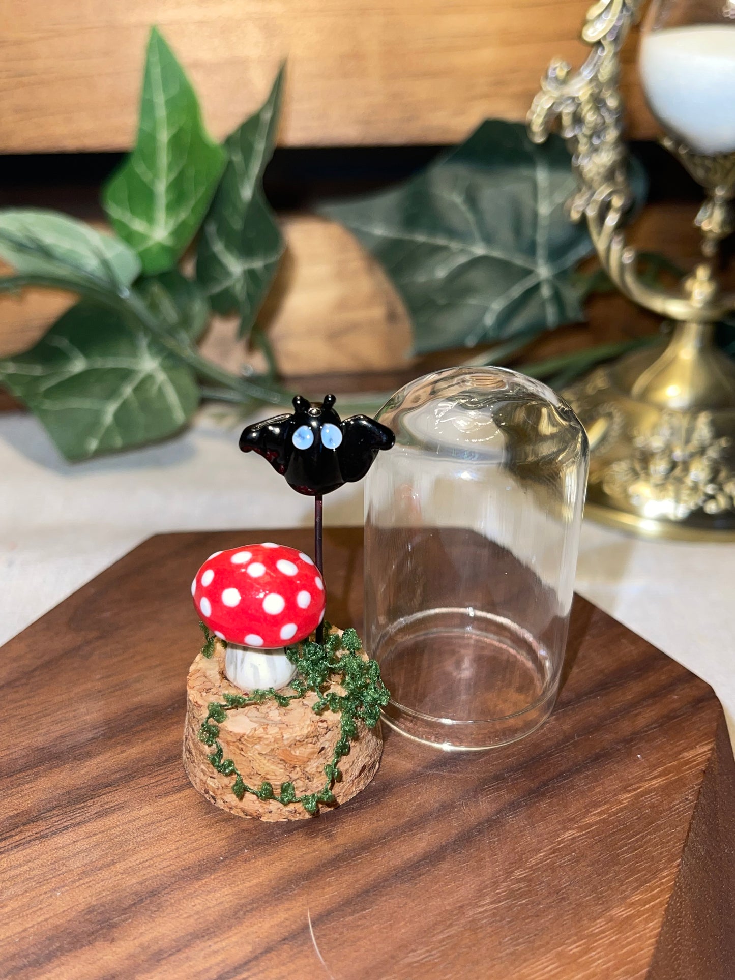 Glass Bat and Ceramic Mushroom in a Glass Dome